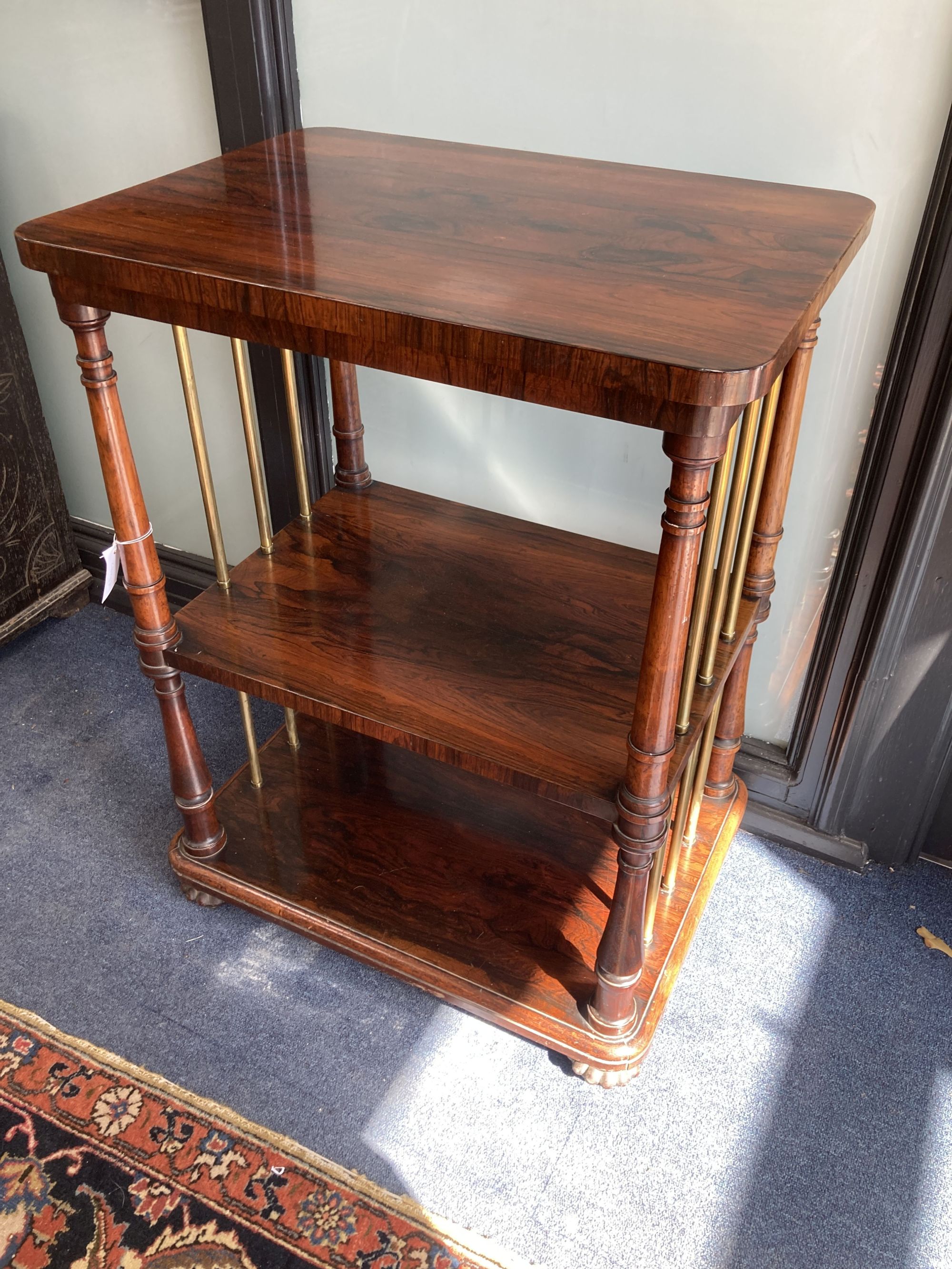 A Victorian rosewood three tier whatnot, width 61cm, depth 46cm, height 84cm